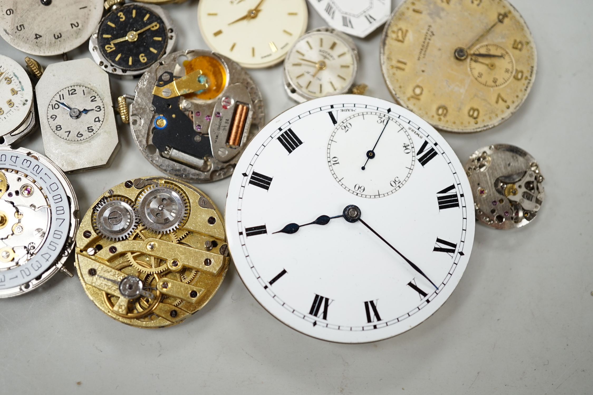 A quantity of assorted wrist and pocket watch parts and movements.